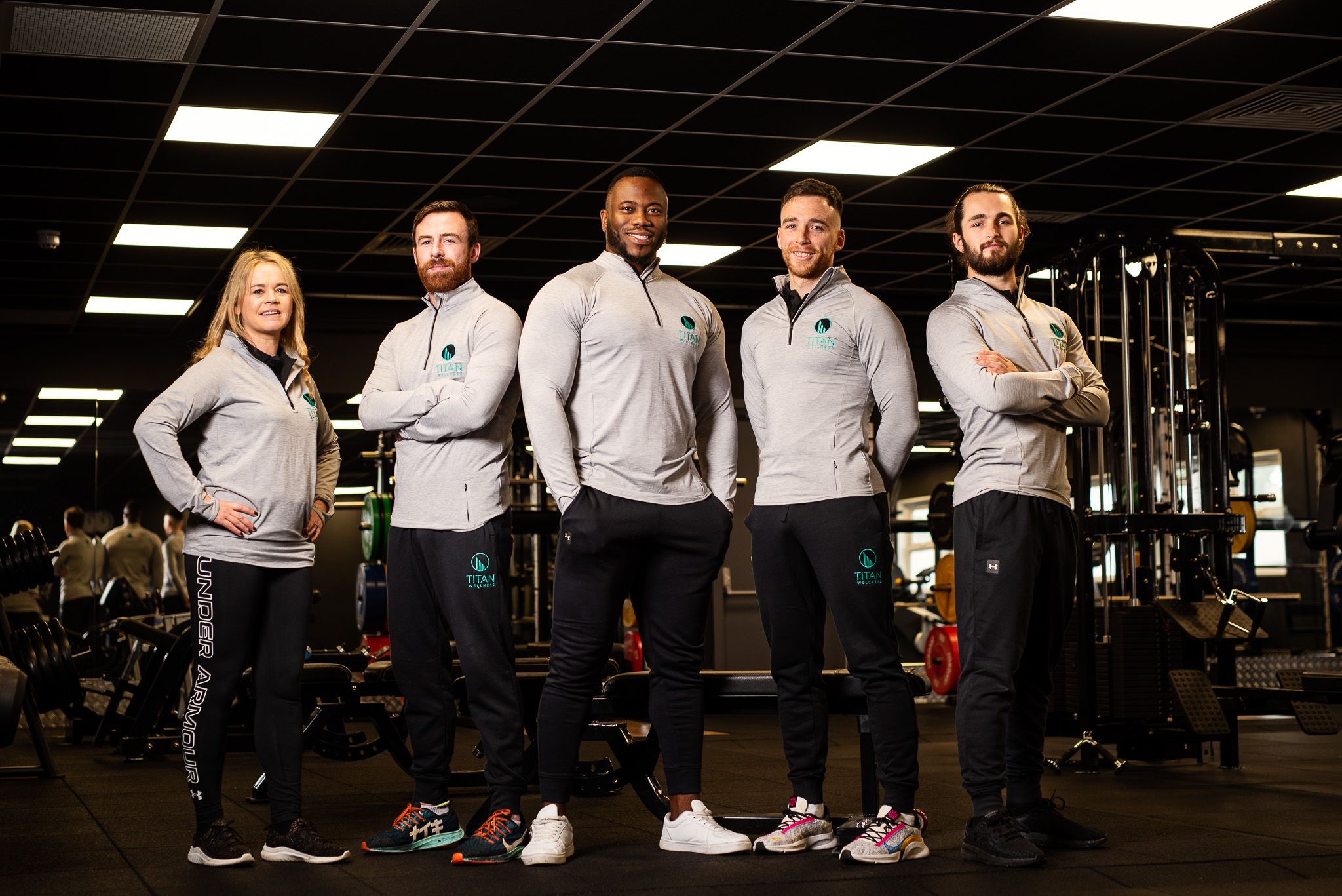 The Titan Wellness fitness team in a gym
